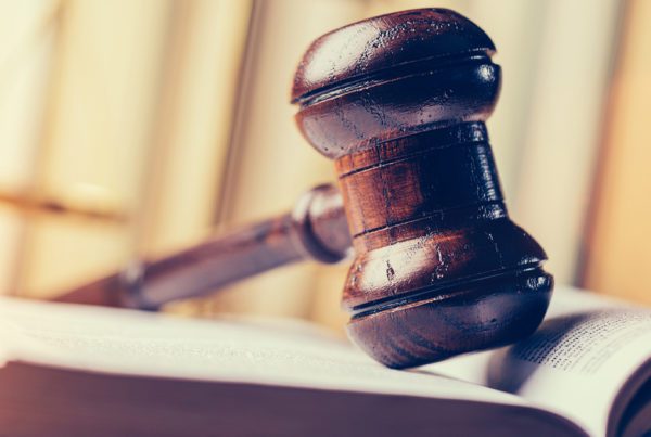 Judge gavel on an open book