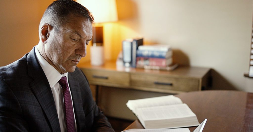 Male attorney working at desk